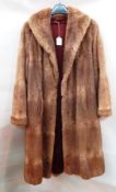 Two vintage fur coats