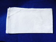 A large quantity of table linen including damask, embroidered, etc.