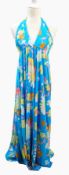 A 1960's halter-neck rayon maxi dress, bright pinks, yellows, whites on a turquoise ground,