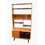 G-Plan light oak and ebonised shelf unit with glazed section, open shelves, drawers and cupboards,