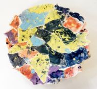 Studio pottery dish of abstract moulded form and mottled multicoloured painted decoration,