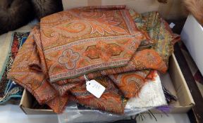 A length of paisley which is cut into pieces to apparently make a jacket, a linen tablecloth,