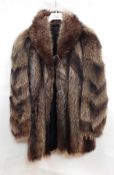 A 1980's raccoon three-quarter length fur coat