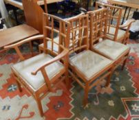 A set of six oak Cotswold-style hatched-back dining chairs in the style of Ernest Gimson