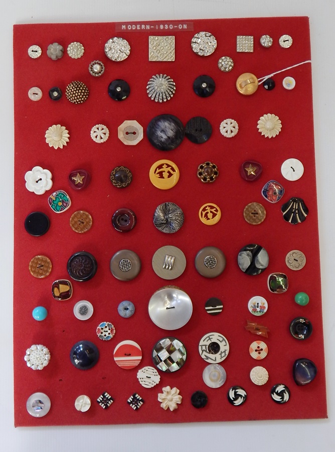 A quantity of buttons including glass, modern buttons which include bakelite, horn, plastic, etc.