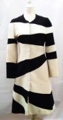 A Jasper Conran black and white striped wool coat with zip fastening,