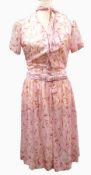 Various vintage dresses, a pink nylon dress by Pennypacker,
