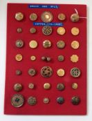 Various buttons set on cards including brass, gilt, copper, ceramic, some showing Humpty Dumpty,