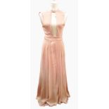 A 1930's crepe de chine salmon pink full-length evening dress with low back and a tie