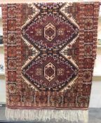 Modern Persian-style wool rug having three stepped lozenge medallions,