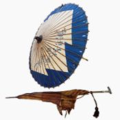 An Edwardian silver-mounted parasol and a Japanese paper parasol (2)