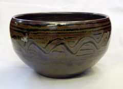 Winchcombe Ray Finch large bowl having purple iridescent glaze with black line decoration,