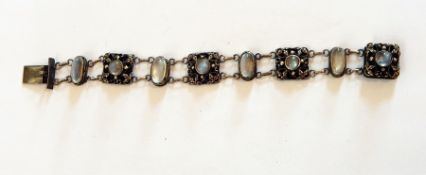 Continental silver-coloured metal and moonstone bracelet having circular cabochon stones within