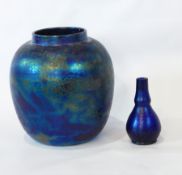 A Ruskin ovoid jar and cover in blue and green mottled-effect,