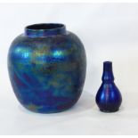 A Ruskin ovoid jar and cover in blue and green mottled-effect,