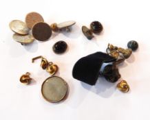 Three 19th century hardstone set seals, two onyx set buttons,