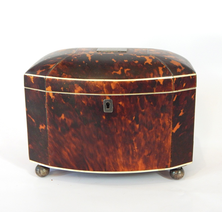 A 19th century bow-front tortoiseshell tea caddy, the top with inset engraved plate,