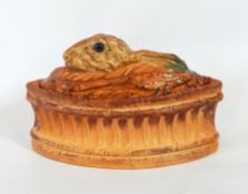 A Pillivuyt & Cie game pie dish with rabbit's head on lid and a German porcelain figure of female