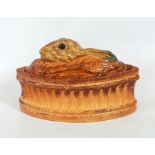 A Pillivuyt & Cie game pie dish with rabbit's head on lid and a German porcelain figure of female