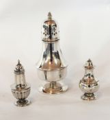 An Edwardian silver pepperpot of tapering bulbous form, raised on circular foot,
