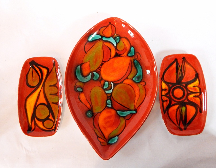 A Poole Delphis pattern oval-shaped dish, orange, green and turquoise on an orange ground,