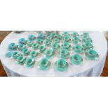 A large quantity of Poole turquoise and grey teacups and saucers (15), coffee cups and saucers (20),