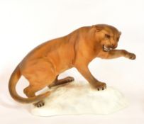 A Beswick model of a puma on rock, matt finish,