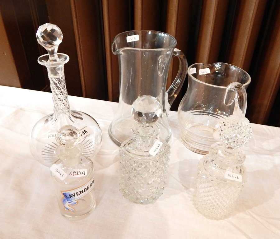A small diamond cut glass scent bottle, and another, a small glass decanter labelled lavender water,