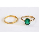 22ct gold fine wedding ring and a 9ct dress ring set with green stone
