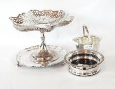 A silver-plate pierced fruit bowl on a raised stem and circular foot, a wavy-edged waiter,