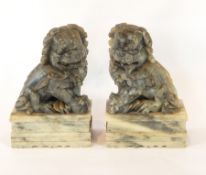 A pair of carved soapstone Dogs of Fo bookends,