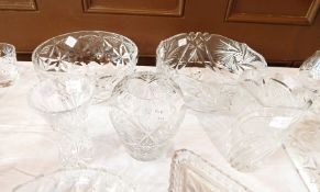 A cut glass fruit bowl, another cut glass fruit bowl, three various cut glass vases,