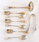 A set of six Victorian silver coffee spoons with floral design and a pair of matching sugar nips,