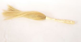Late 19th/early 20th century ivory handled fly swish,