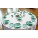 A Poole part dinner service including bowls, turquoise and grey, a covered casserole dish,