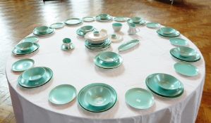 A Poole part dinner service including bowls, turquoise and grey, a covered casserole dish,