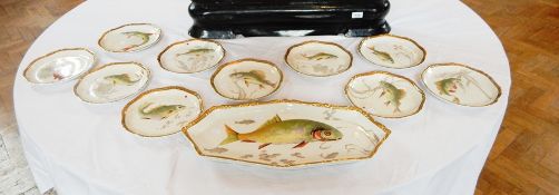 A Villeroy & Boch fish service decorated with different fish, large serving platter and ten plates,