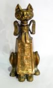 A novelty brass door stop in the form of a cat, incised "East West Hames Best",