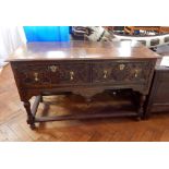 Early 18th century oak dresser base with moulded edge top,