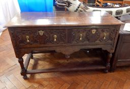 Early 18th century oak dresser base with moulded edge top,