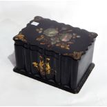 A Victorian papier mache tea caddy of rectangular wavy form,