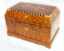 A large inlaid Moroccan thuya wood casket with floral and chequerwork inlays,