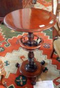 A Victorian mahogany occasional table, the circular top with moulded edge,