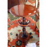 A Victorian mahogany occasional table, the circular top with moulded edge,