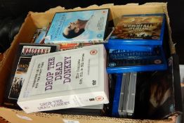 A large quantity of DVDs to include "Drop the Dead Donkey", "The Magnificent Seven", "Titanic", etc.