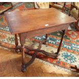 An 18th century style oak rectangular top side table with moulded edge and frieze drawer,
