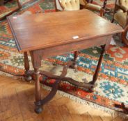 An 18th century style oak rectangular top side table with moulded edge and frieze drawer,