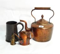 An old copper kettle, a copper dish, a vase, a watering can,