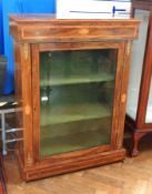 A Victorian walnut display cabinet with satinwood shell and fan inlay ormolu mounts,