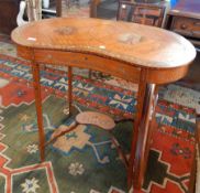 An Edwardian Kingwood kidney shaped side table, the top painted with figures of cavaliers,